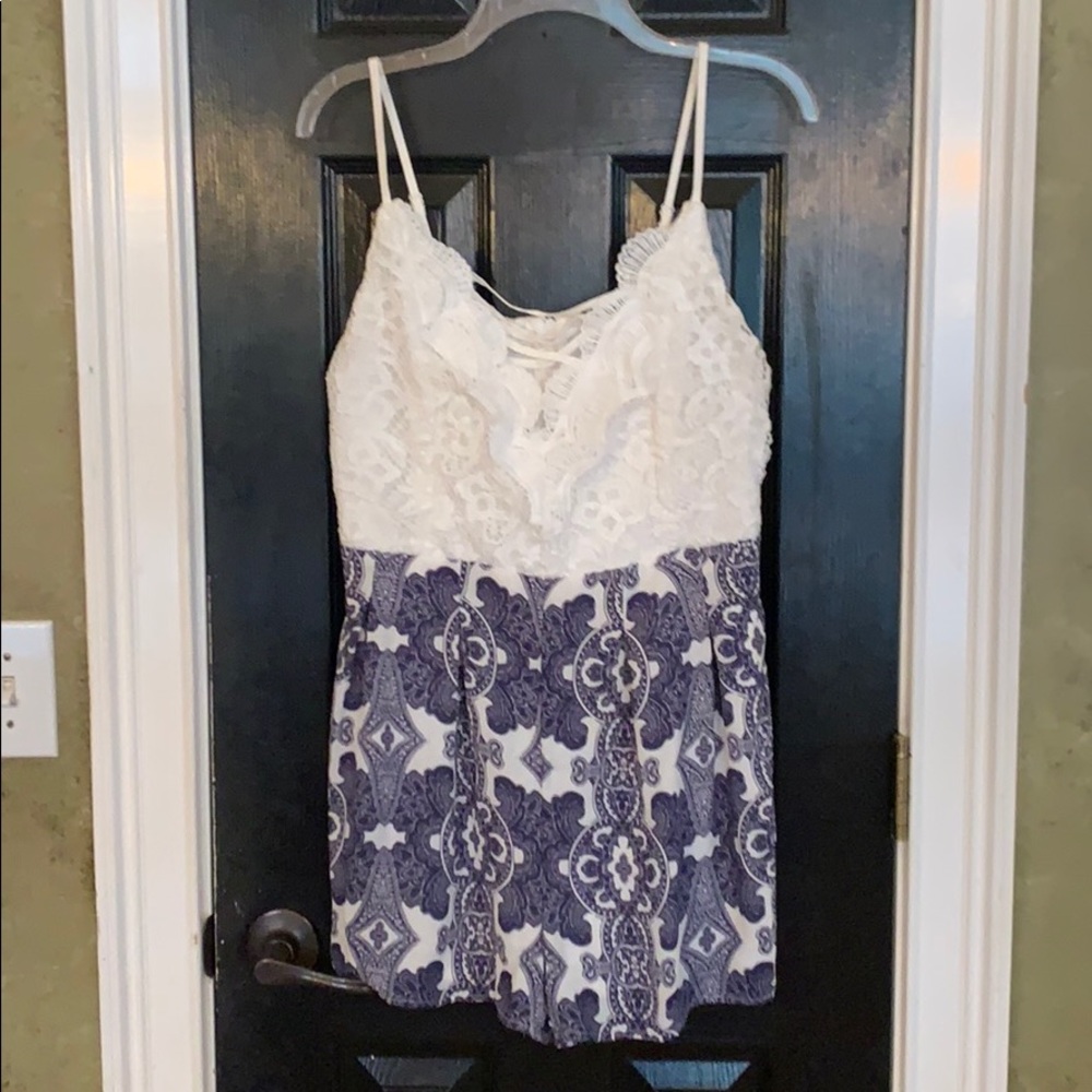 Deep V lace romper size large